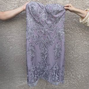 Beautiful strapless dress with lace design and sheer cover up.
